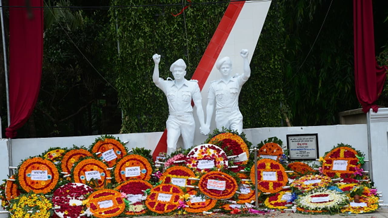 Bangladesh Gulshan memorial was demolished and posters of militants were hung bsm