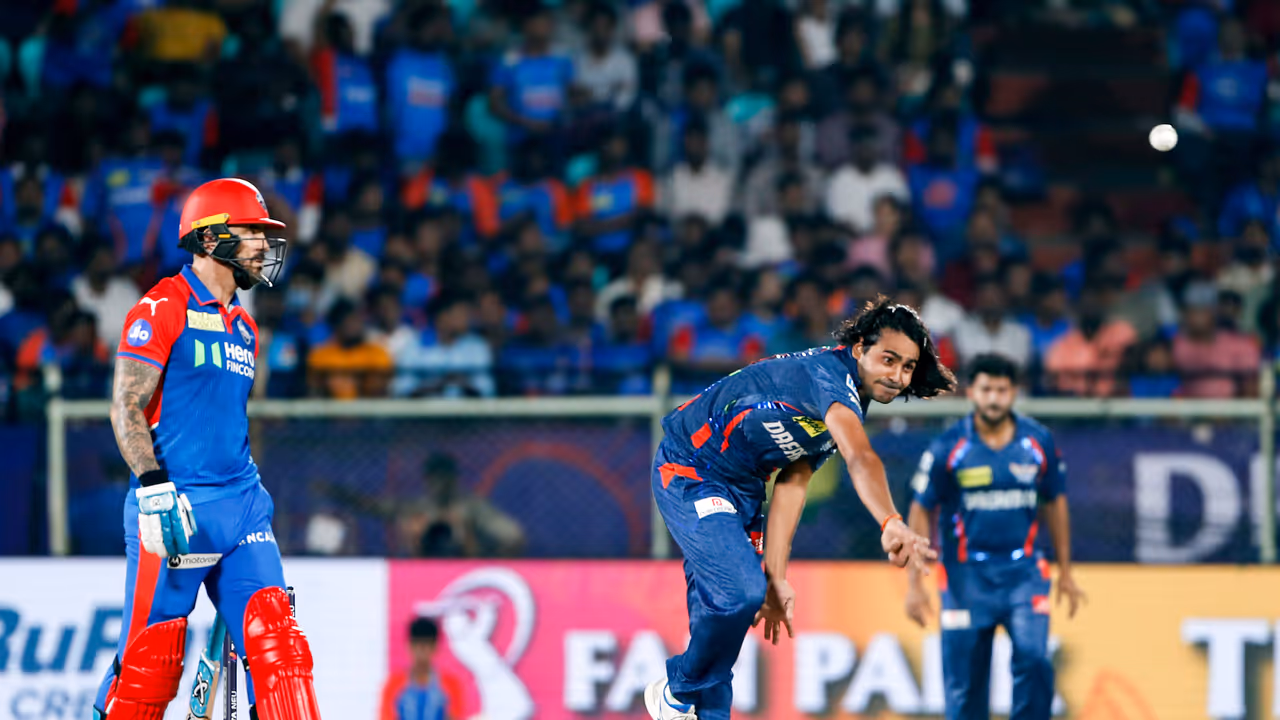 Lucknow Super Giants' Digvesh Rathi bowls during the match against Delhi Capitals'