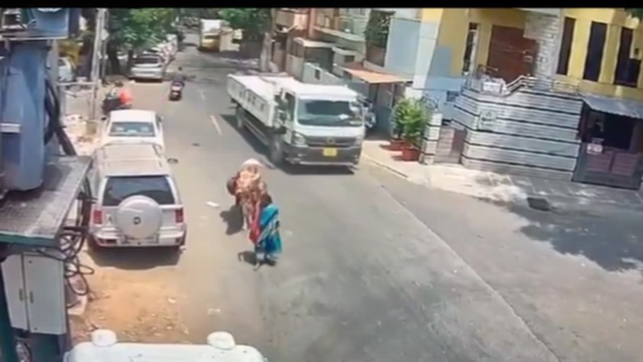 Man by bull in Bangalore video goes viral on internet Man by bull in Bangalore video goes viral on internet