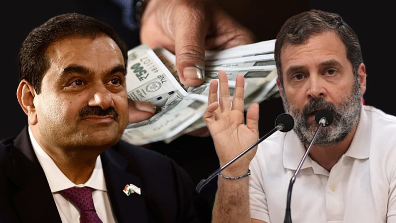 RAHUL GANDHI AND GOUTAN ADANI RAHUL GANDHI AND GOUTAN ADANI