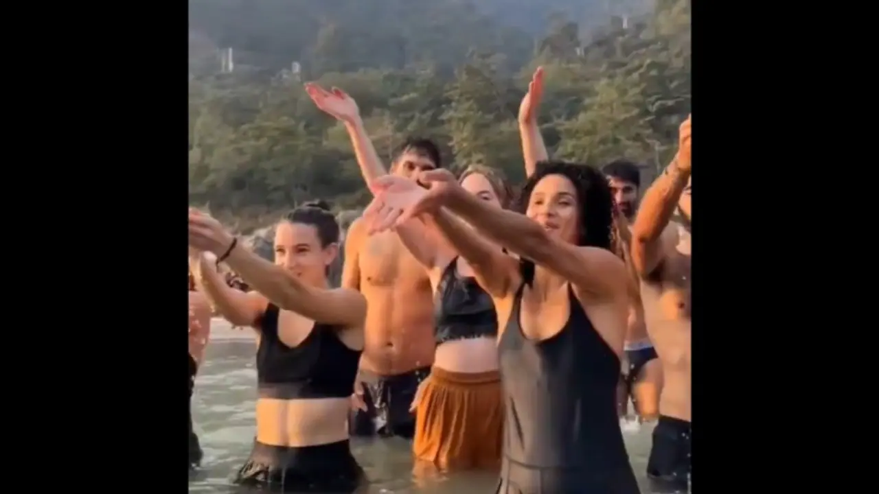 Rishikesh Viral Video Netizens react to half naked foreign nationals bathing in the Ganges bsm Rishikesh Viral Video Netizens react to half naked foreign nationals bathing in the Ganges bsm