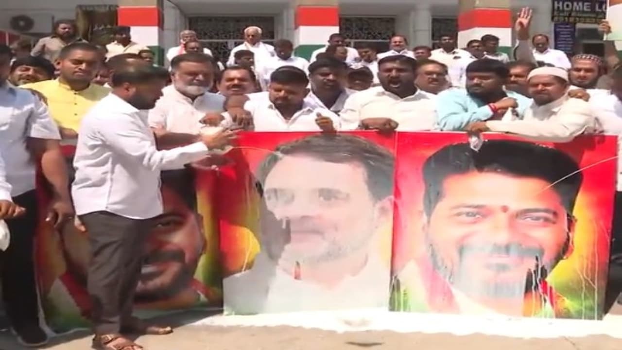 Milk poured on Rahul Gandhi posters