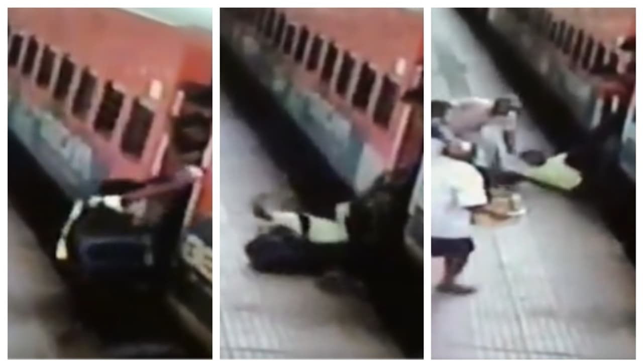 Railway police officer save a mans life after he fall under a running train