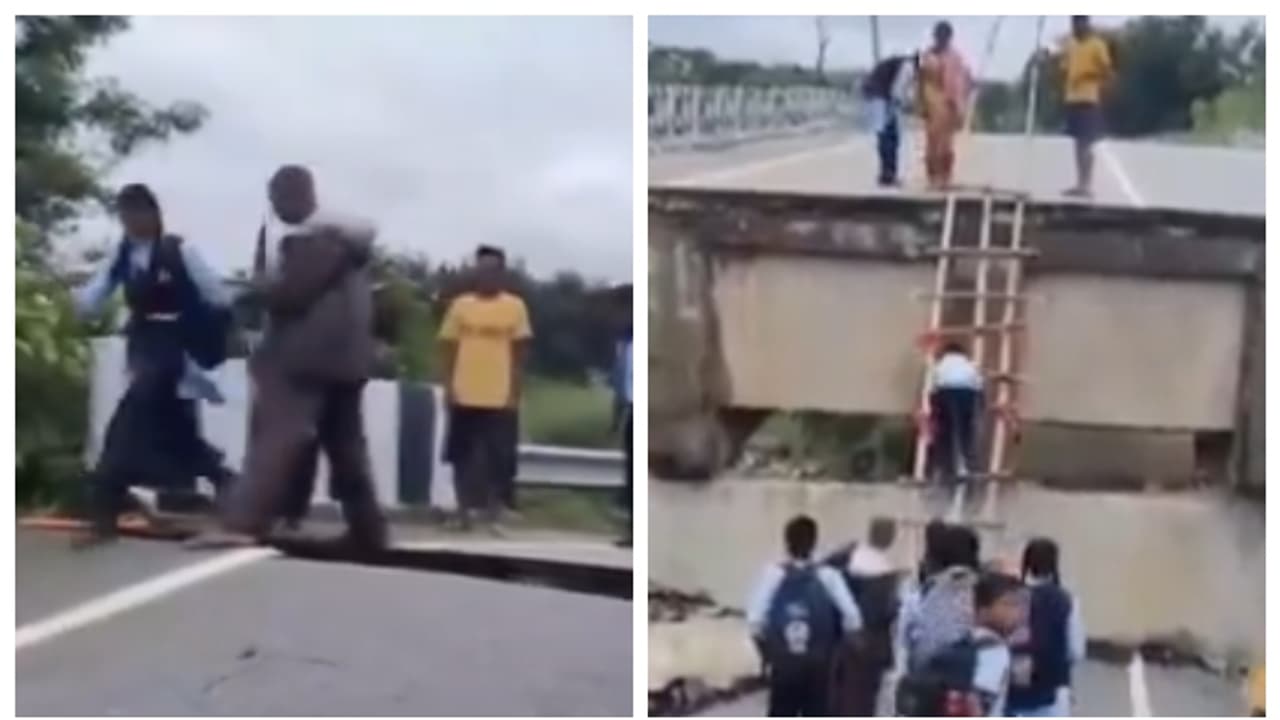 children use bamboo ladder to climbing a fallen bridge to go to school