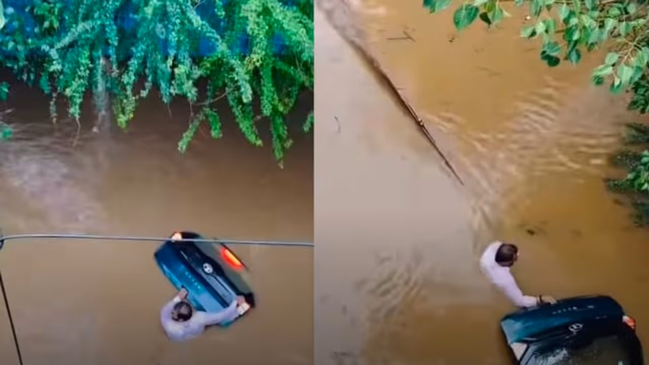 Pune Man Refuses to Abandon His Tata Nexon EV During Floods, Emotional Rescue Video Goes Viral (WATCH) Pune Man Refuses to Abandon His Tata Nexon EV During Floods, Emotional Rescue Video Goes Viral (WATCH)