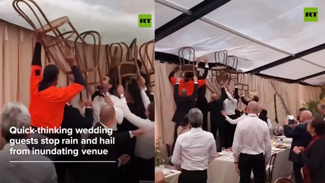 Australia Viral Video: Wedding Guests In Suits Hold Up Roof With Chairs As Heavy Rain, Hail Hit Sydney Venue Australia Viral Video: Wedding Guests In Suits Hold Up Roof With Chairs As Heavy Rain, Hail Hit Sydney Venue