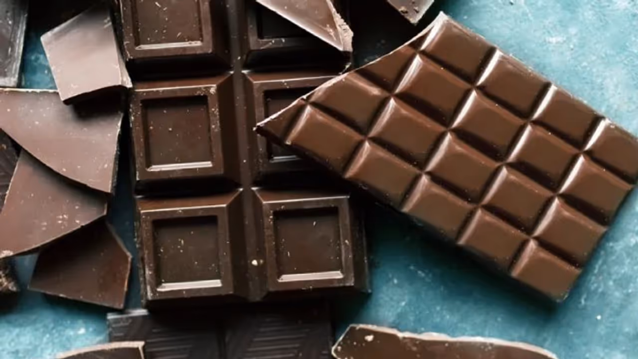 Human Finger in Chocolate bar Human Finger in Chocolate bar