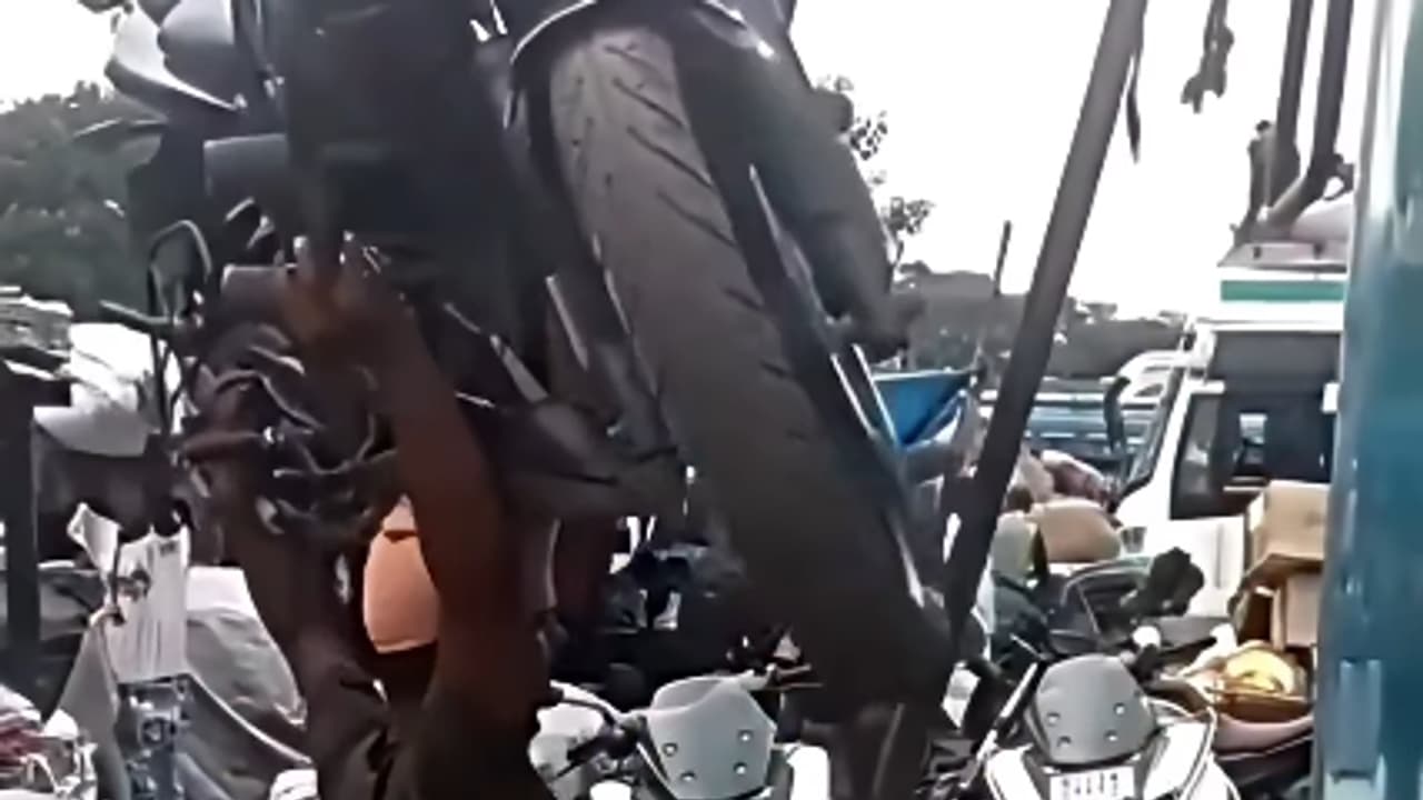 Man Carries 164 Kg Motorcycle On Neck While Climbing Ladder Man Carries 164 Kg Motorcycle On Neck While Climbing Ladder
