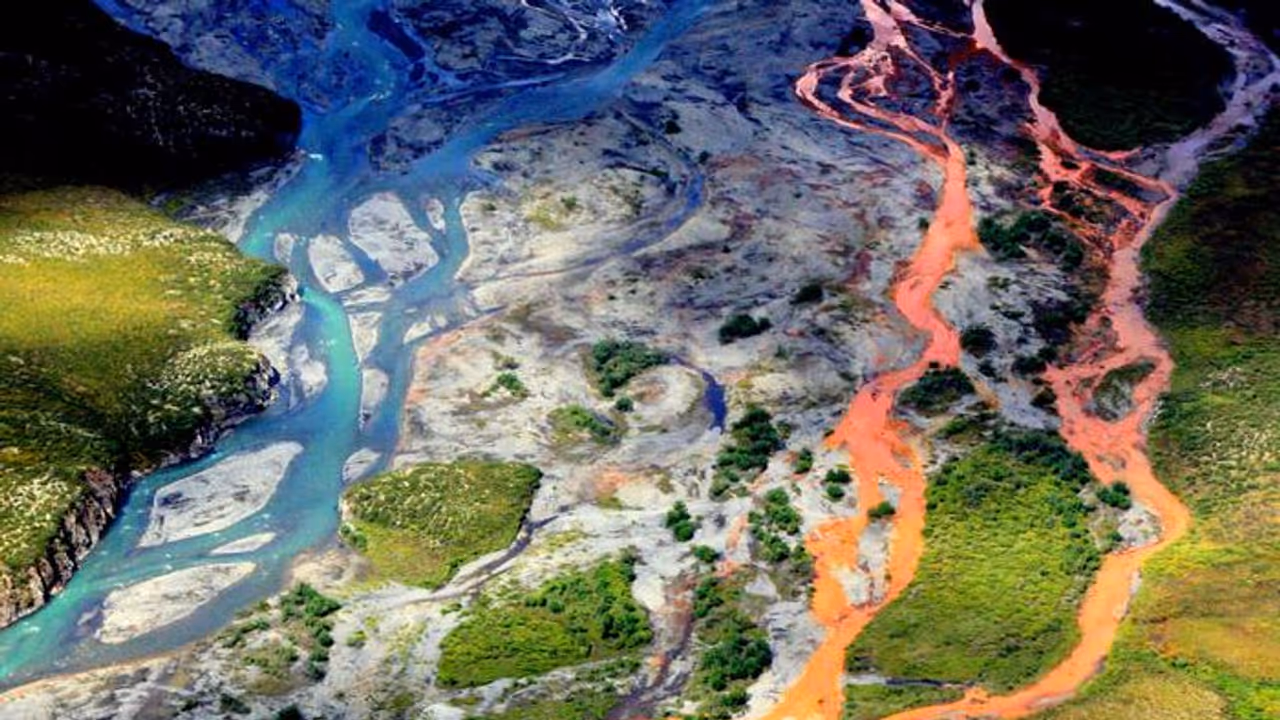 Scenic aerial photo of Alaska’s Kutuk River stained orange