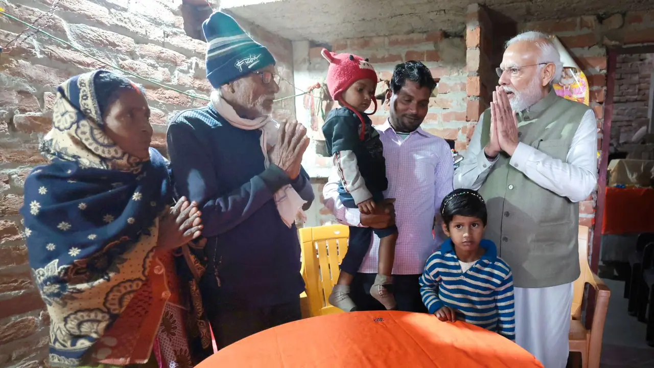 Narendra Modi with Meera Manjhi family Narendra Modi with Meera Manjhi family