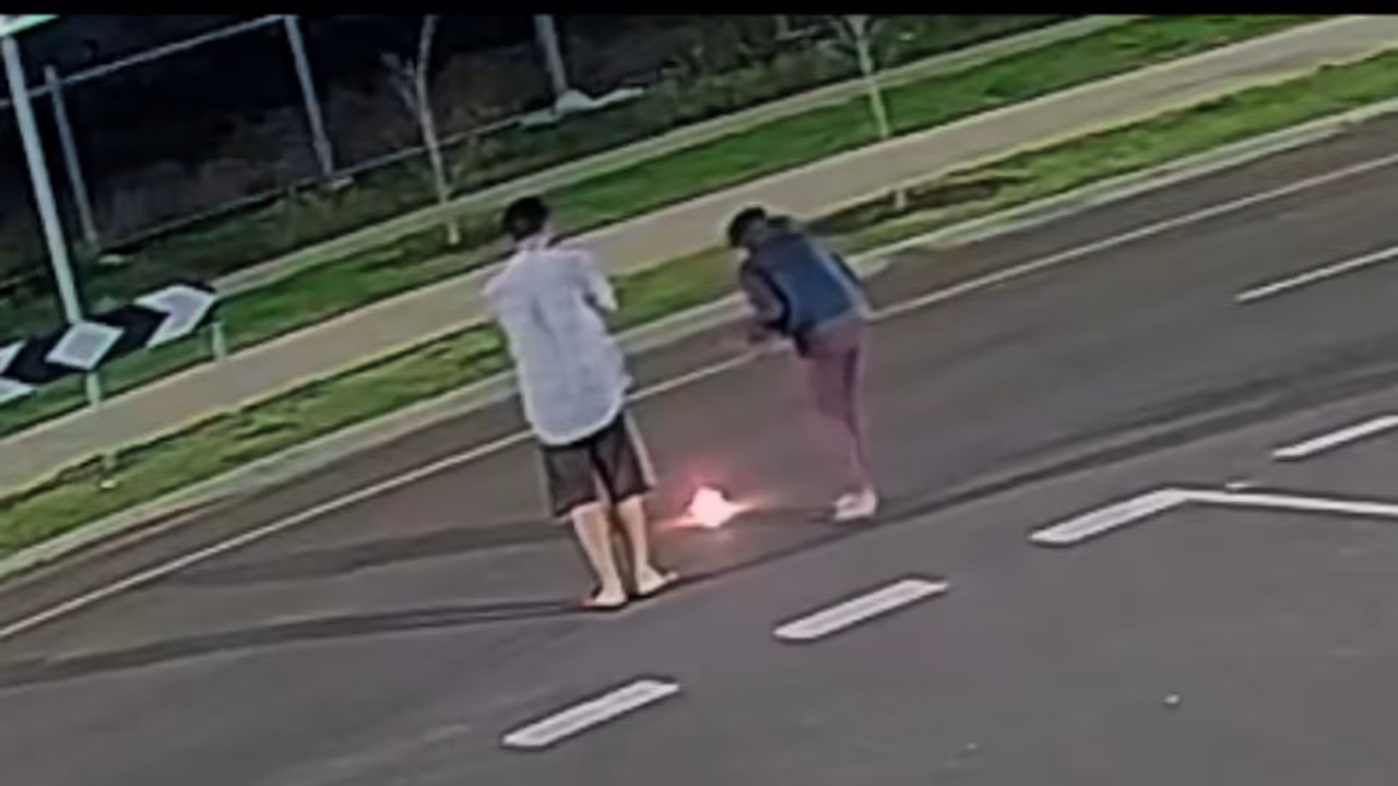 Woman Placing Lamp On Melbourne Road Sparks Black Magic Speculation Woman Placing Lamp On Melbourne Road Sparks Black Magic Speculation