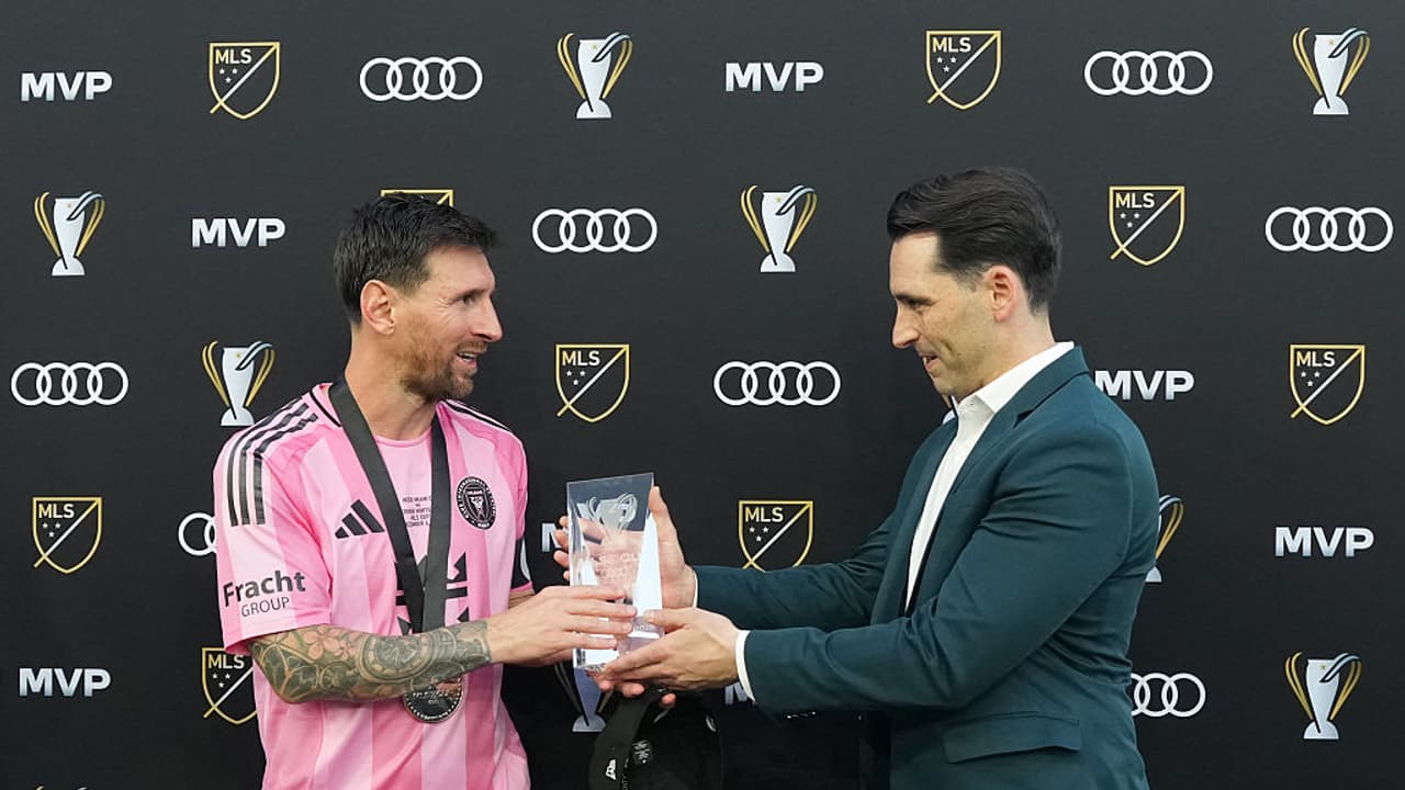 Messi receiving MVP award Messi receiving MVP award