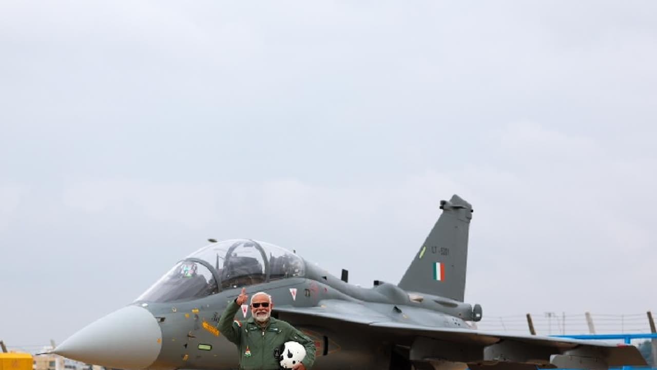 Narendra Modi with Tejas jet