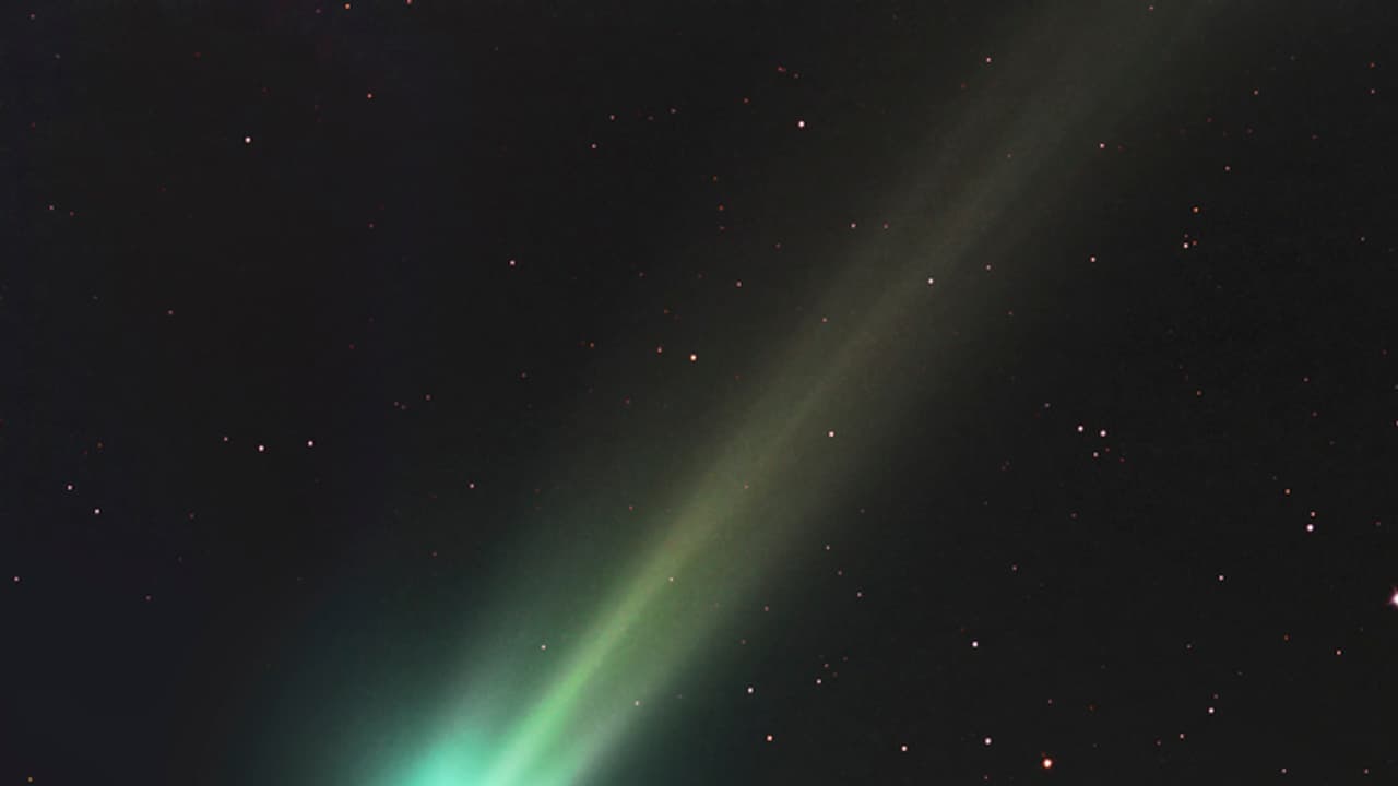 Green comet in the night sky Green comet in the night sky