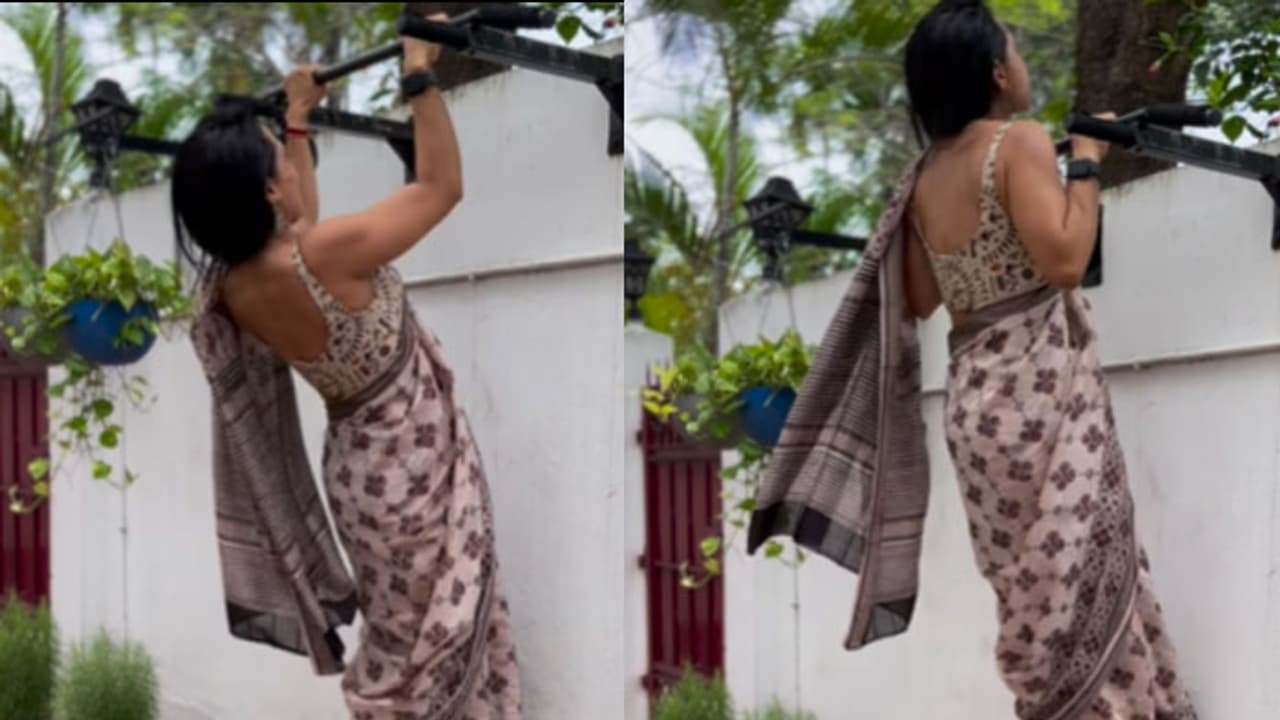 woman pullups in saree