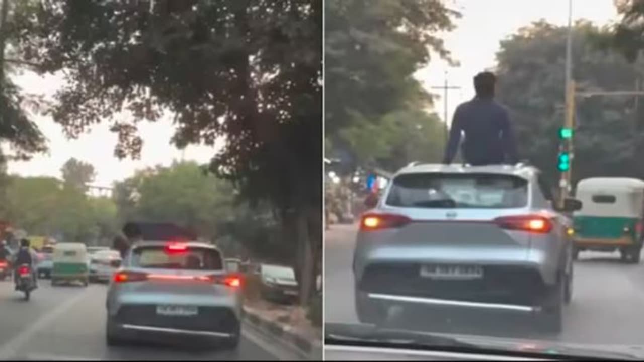 couples dangerous kissing stunt in moving car video viral couples dangerous kissing stunt in moving car video viral