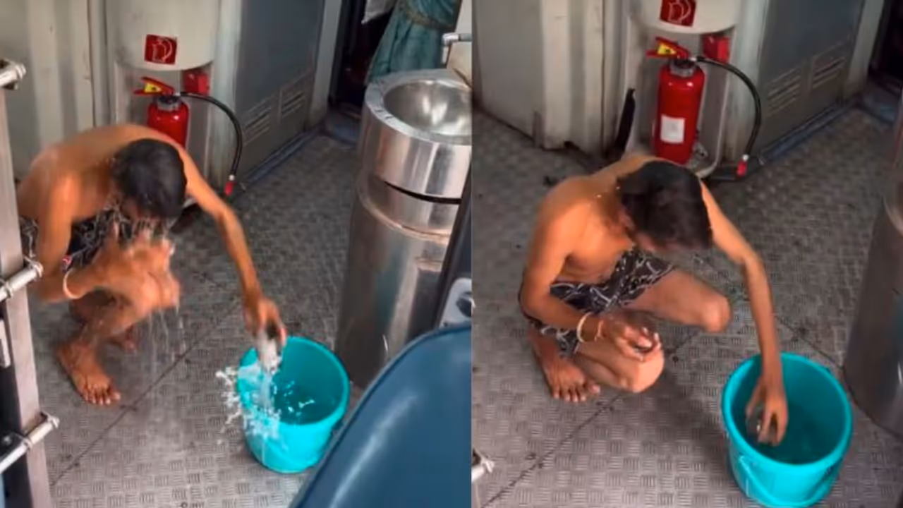 Indian Railways Passenger bathes inside coach 