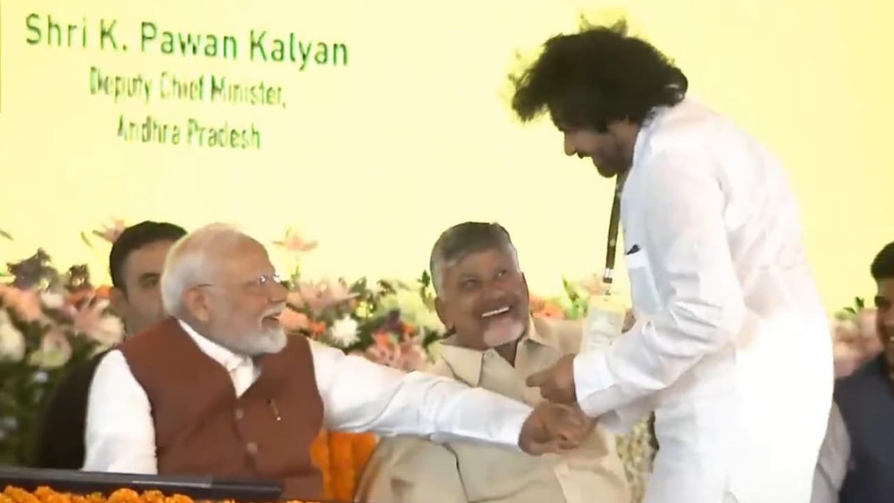 PM Modi greets Pawan Kalyan with chocolate