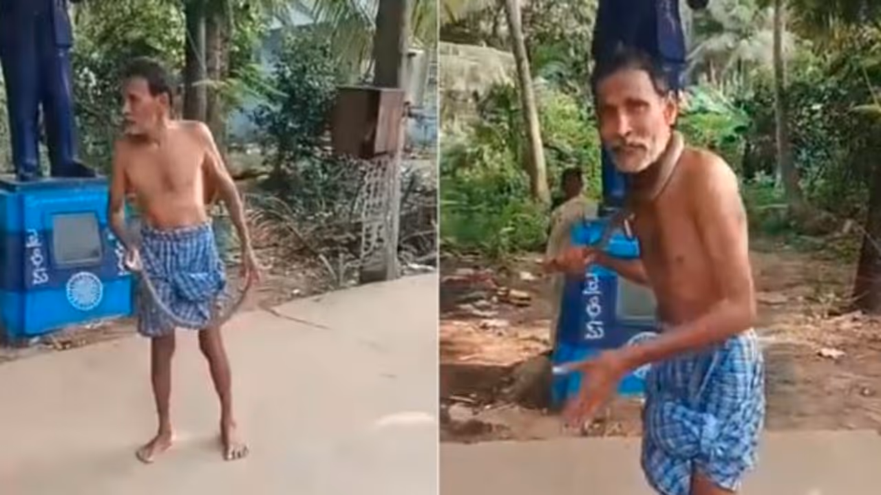 drunk man plays with snake