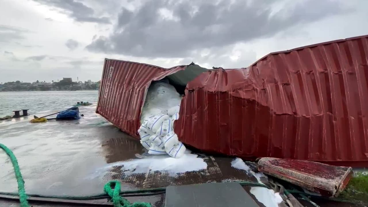 A container of Liberia flagged container vessel that sank off Kochi washed ashore at Kollam coast, being removed