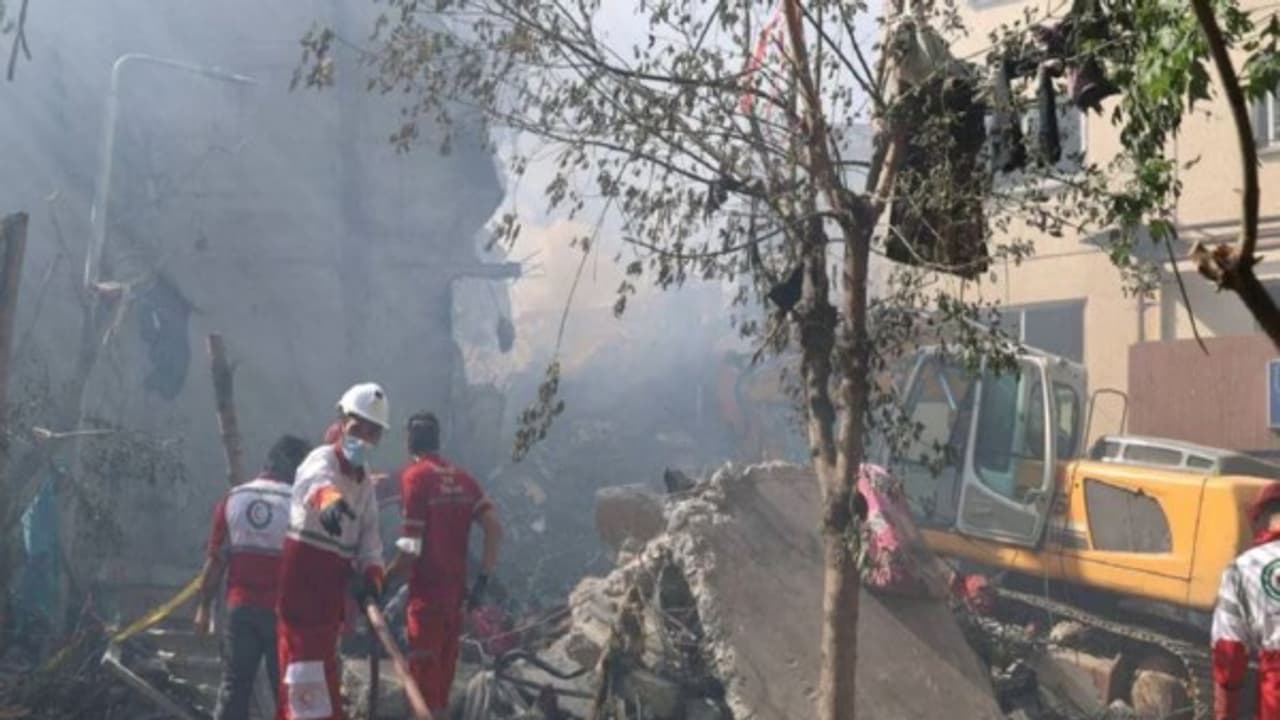 Rescuers work at the site of a damaged building, in the aftermath of Israeli strikes in Tehran, Iran, June 13 (Photo/Reuters) Rescuers work at the site of a damaged building, in the aftermath of Israeli strikes in Tehran, Iran, June 13 (Photo/Reuters)