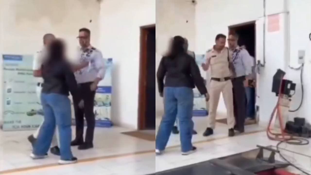 Tense moment unfolds between employee and manager during dispute Tense moment unfolds between employee and manager during dispute