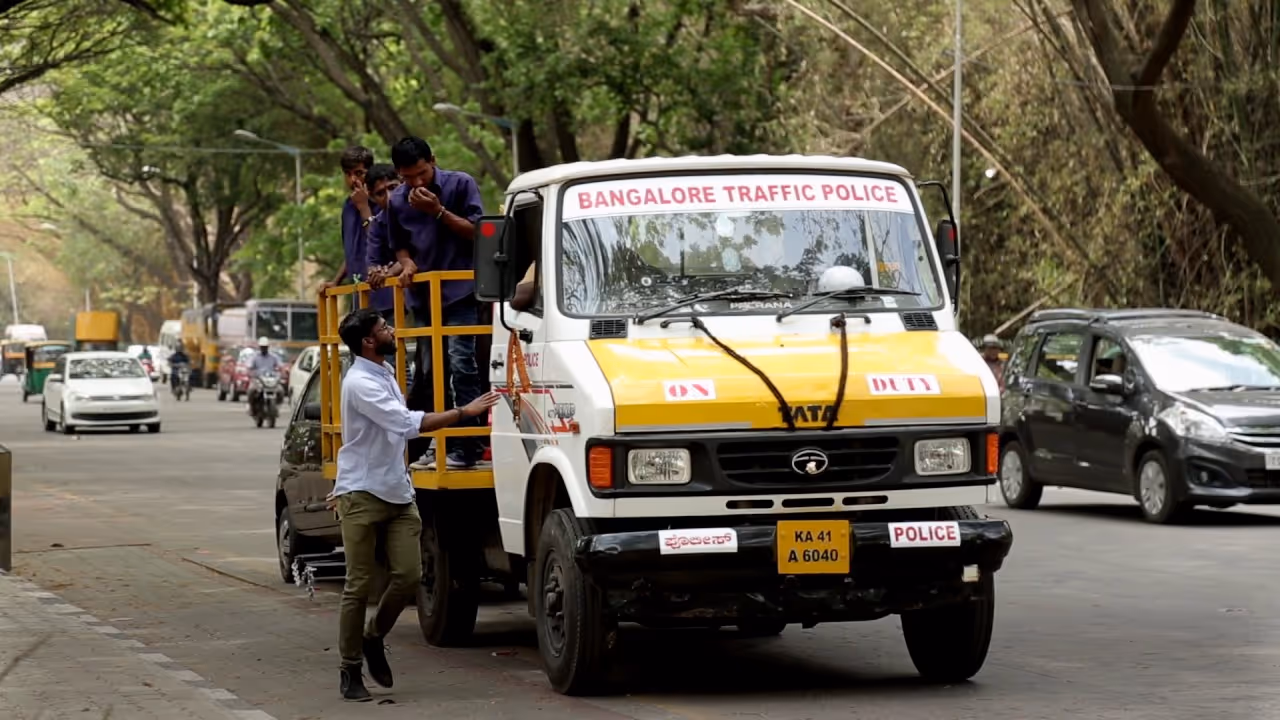 Motorists protest high vehicle towing charges in Bengaluru Motorists protest high vehicle towing charges in Bengaluru