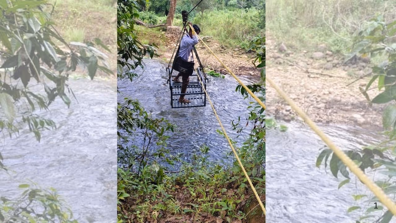 Election officials cross stream using rope for voter verification Election officials cross stream using rope for voter verification