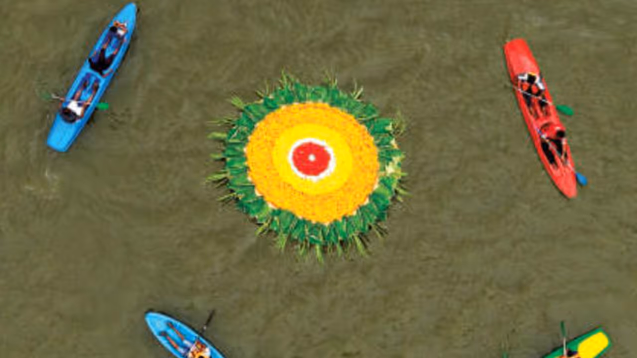 Giant floating pookalam adds colour to Vembanad Lake on Uthradam Giant floating pookalam adds colour to Vembanad Lake on Uthradam