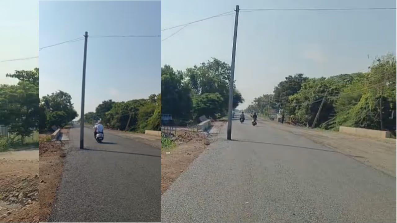 Electric pole stands in the middle of a newly tarred road in Ballari Electric pole stands in the middle of a newly tarred road in Ballari