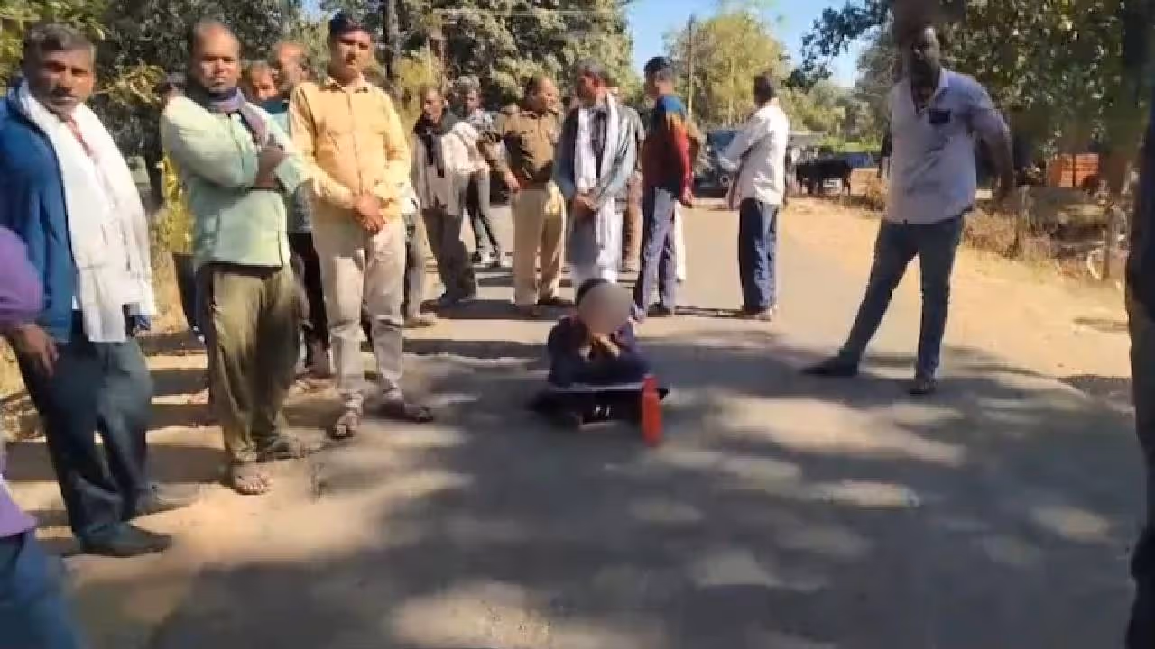 Schoolgirl blocks road Schoolgirl blocks road