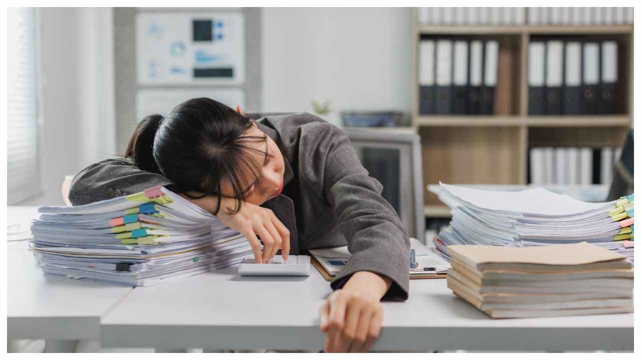 Woman sleeping at working time Woman sleeping at working time