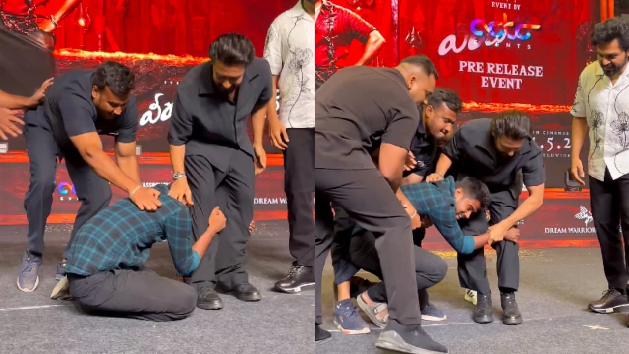 suriya sivakumars reaction to a fan who hold his legs at VeeraBhadrudu pre release event viral video suriya sivakumars reaction to a fan who hold his legs at VeeraBhadrudu pre release event viral video