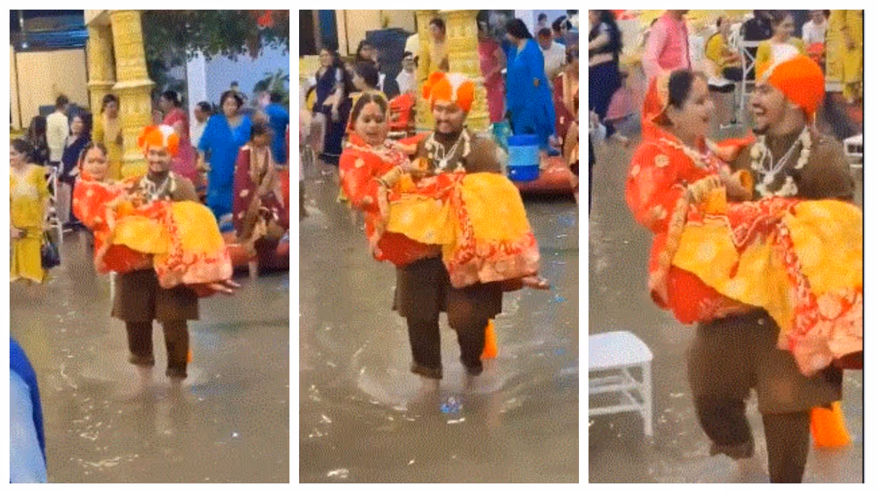 Groom Carries Bride after heavy rain Groom Carries Bride after heavy rain
