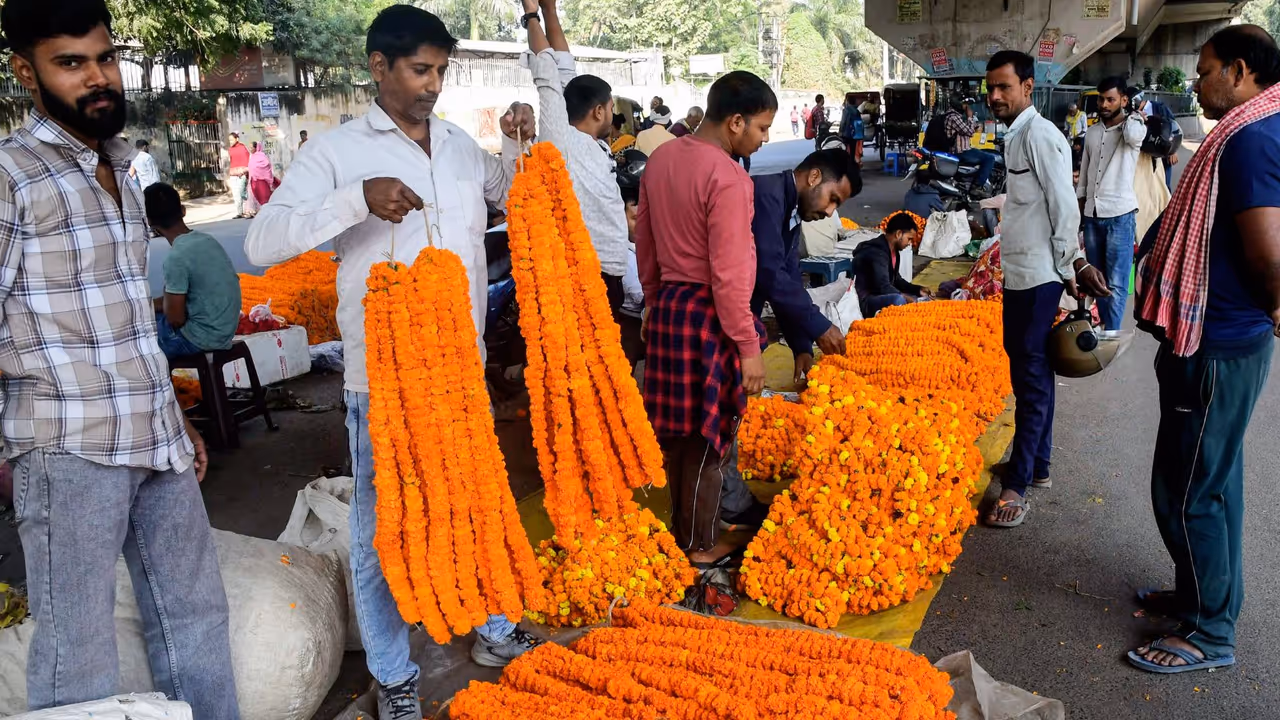 Vendor sells flower garlands on the eve of Bihar assembly election result,