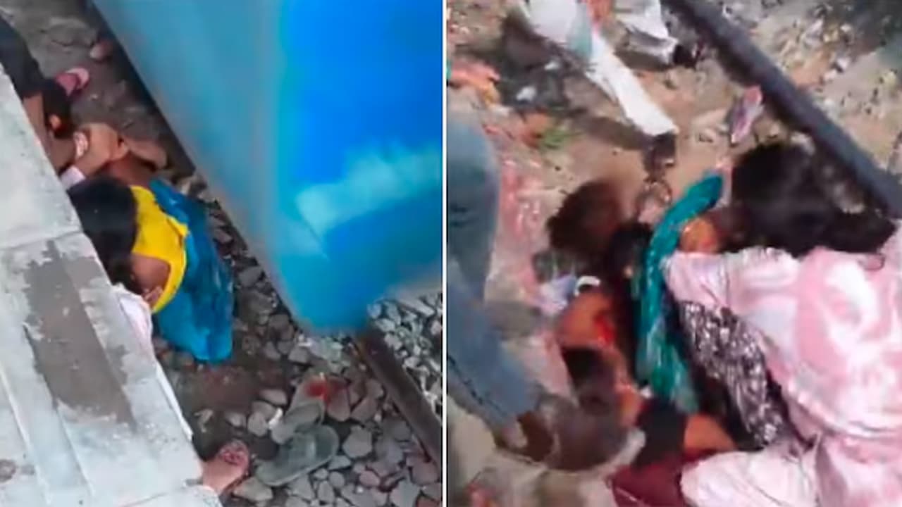 Mother Shields Children With Her Body as Train Passes Inches Away, Video Goes Viral Mother Shields Children With Her Body as Train Passes Inches Away, Video Goes Viral