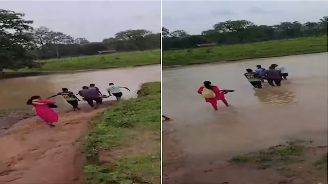 Pregnant woman carried on cot through flooded stream in Maharashtra Pregnant woman carried on cot through flooded stream in Maharashtra