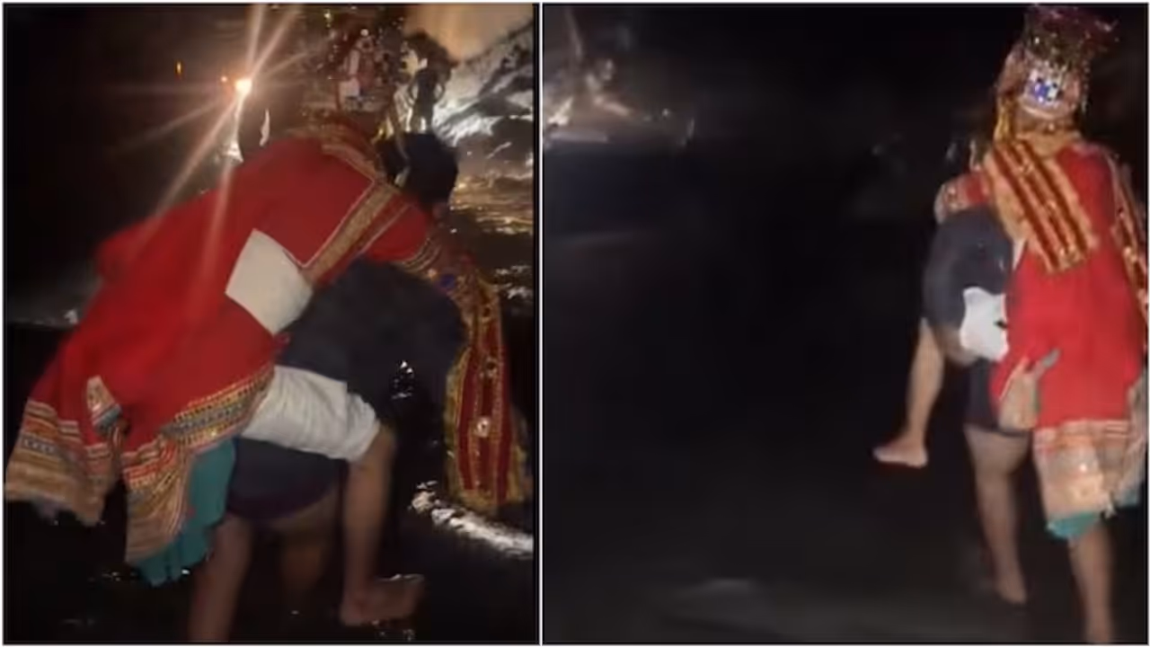 Groom Trapped On Wrong Side Of Flood, Friend Carries Him On Back To Reach Bride Groom Trapped On Wrong Side Of Flood, Friend Carries Him On Back To Reach Bride