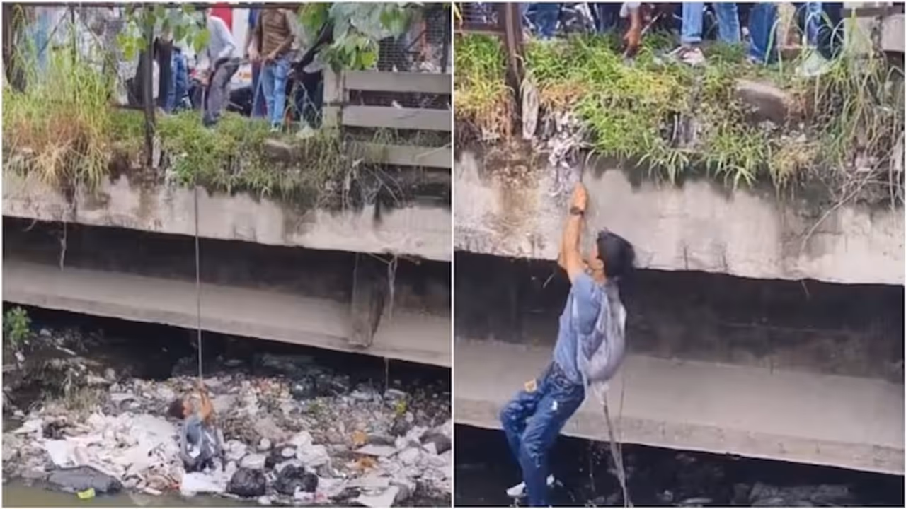 Man Falls Into Open Drain Near Delhi's Mathura Road, Locals Form Rescue Team With Cable Man Falls Into Open Drain Near Delhi's Mathura Road, Locals Form Rescue Team With Cable