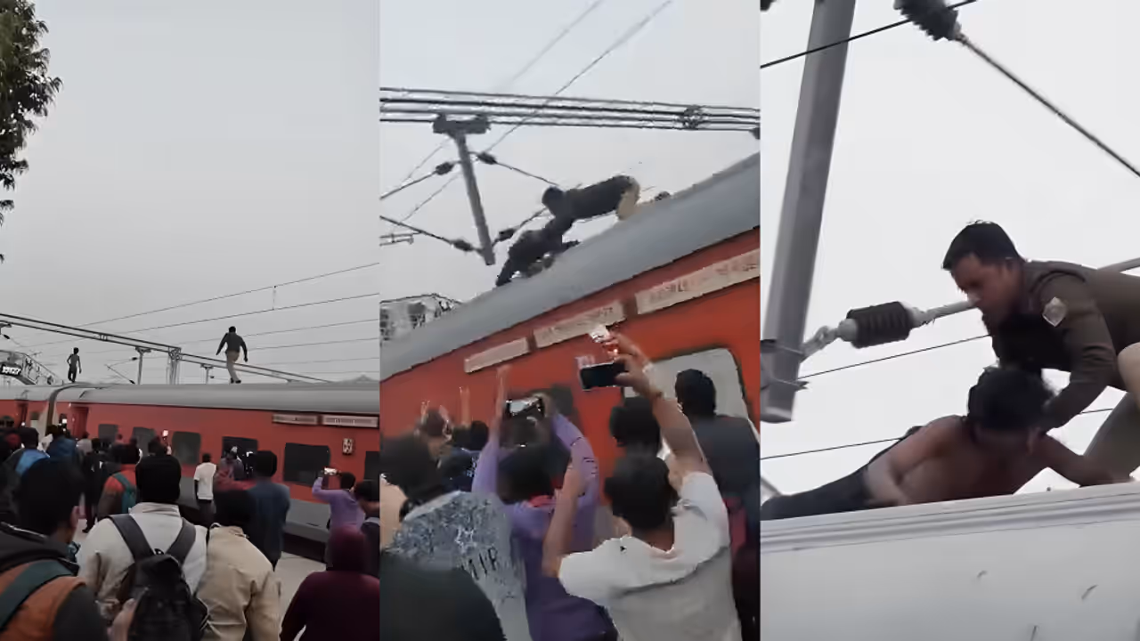 UP Cop Risks Life To Pull Man Off Moving Train Roof, Internet Praises Him UP Cop Risks Life To Pull Man Off Moving Train Roof, Internet Praises Him