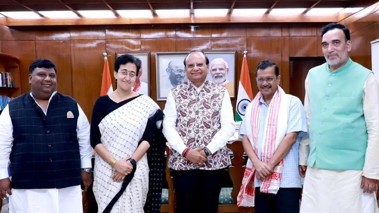 Atishi with LG and Kejriwal