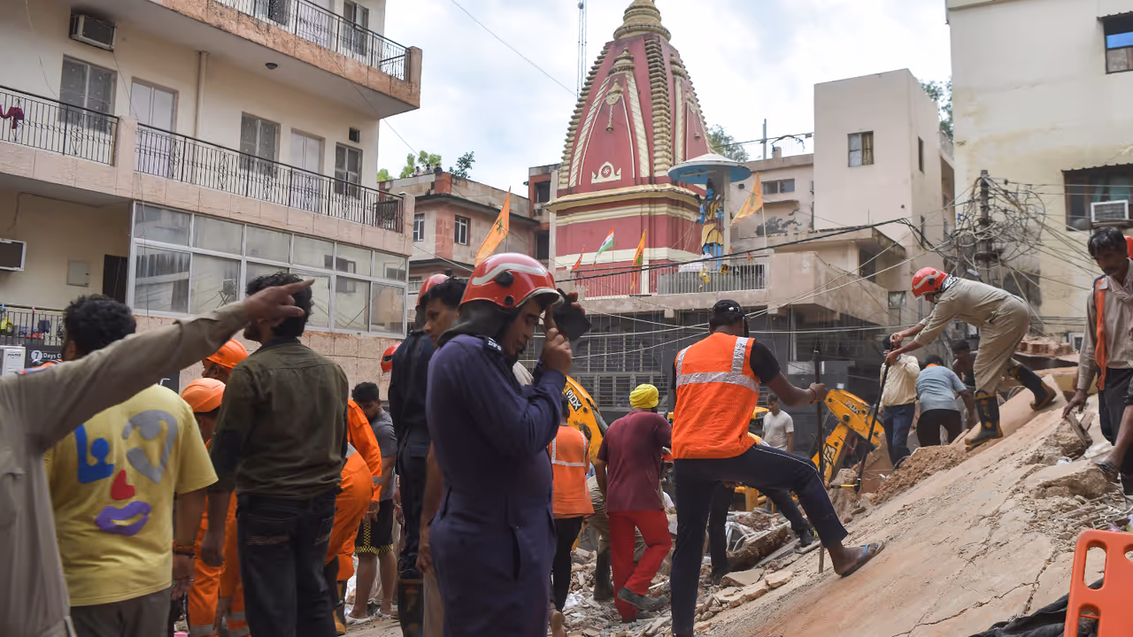 Delhi Building Collapse 6 Storey PG Collapses in Satya Niketan Students Feared Trapped Delhi Building Collapse 6 Storey PG Collapses in Satya Niketan Students Feared Trapped