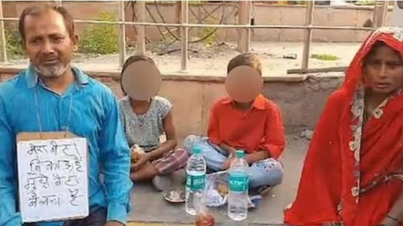 Helpless father sat with a placard to sell children in Uttar Pradesh to pay off debts bsm Helpless father sat with a placard to sell children in Uttar Pradesh to pay off debts bsm