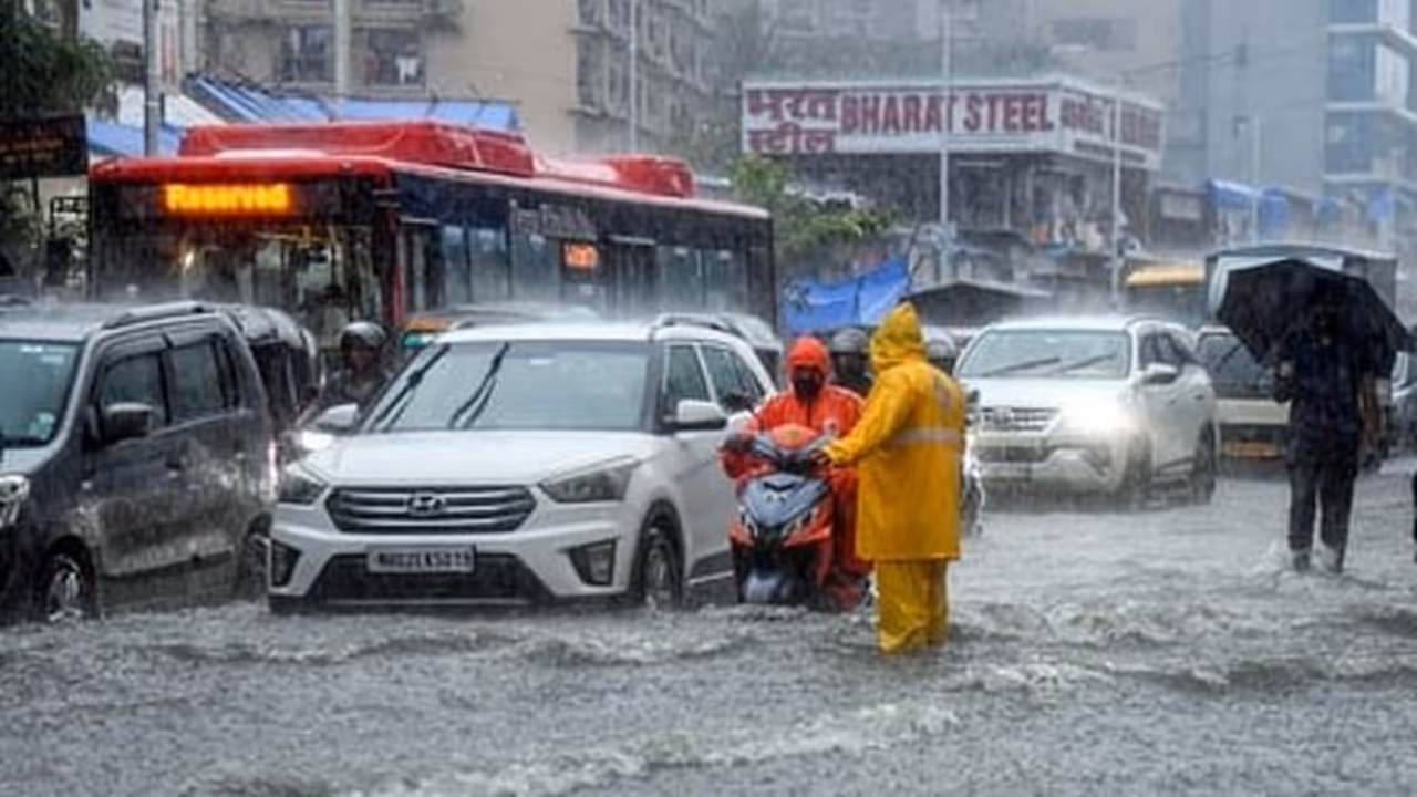 mumbai heavy rain imd red alert waterlogging vasai virar ghatkopar local trains monsoon mumbai heavy rain imd red alert waterlogging vasai virar ghatkopar local trains monsoon