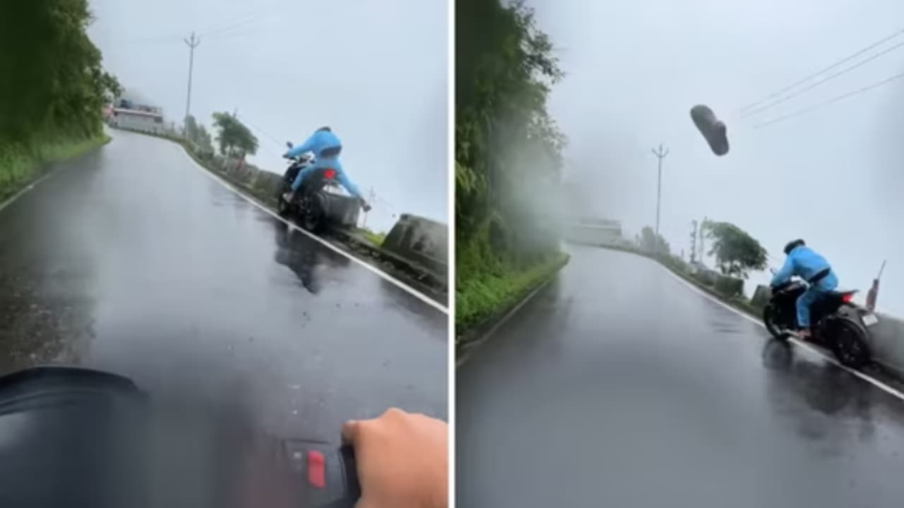 Biker Cheats Death on Rain Soaked Darjeeling Road Biker Cheats Death on Rain Soaked Darjeeling Road
