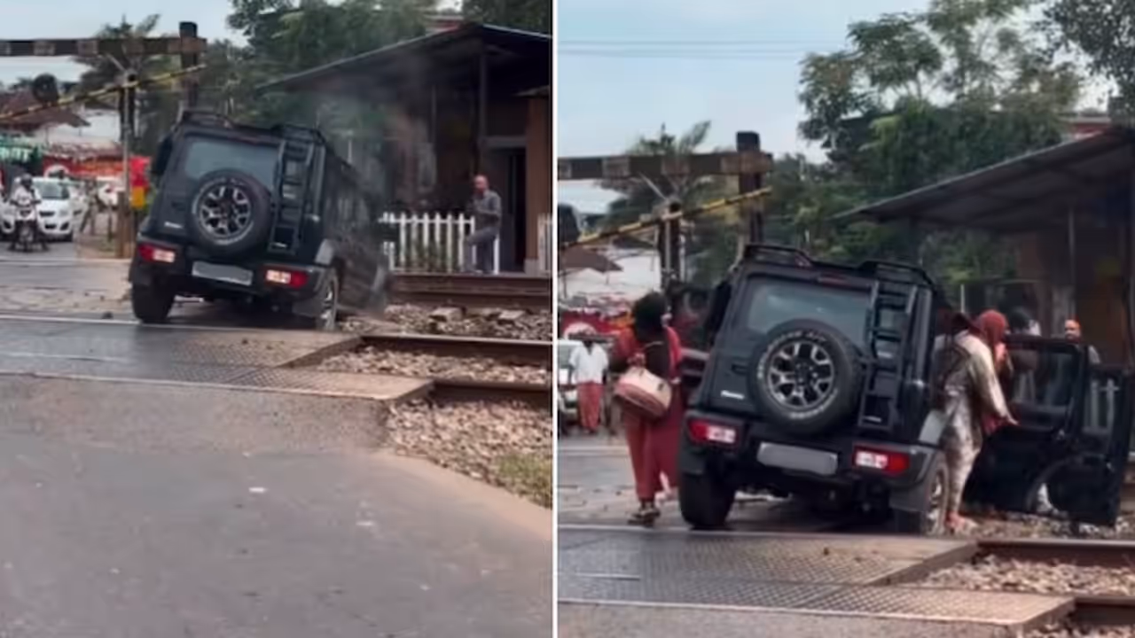 Watch: Car Stuck on Railway Track in Kerala, Driver Flees Moments Before Train Arrives; Video Goes Viral Watch: Car Stuck on Railway Track in Kerala, Driver Flees Moments Before Train Arrives; Video Goes Viral