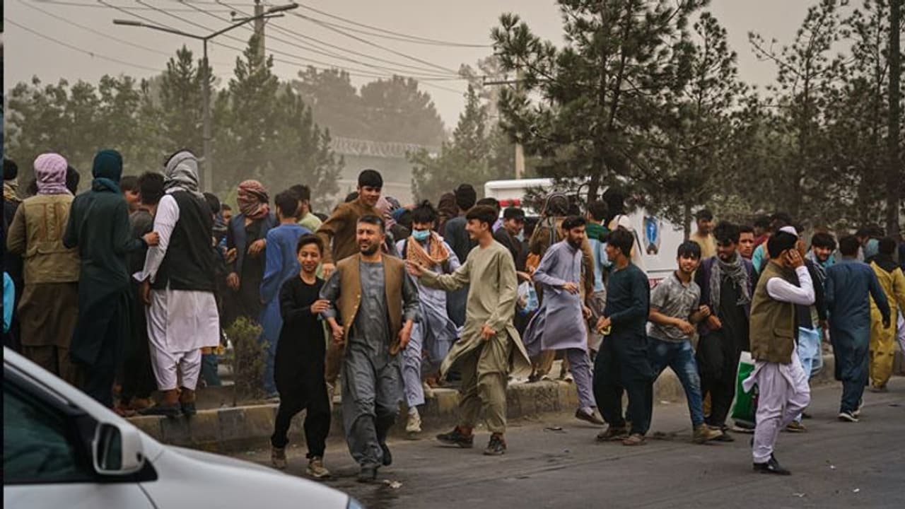 Afghan conflict: Several killed amid Taliban firing and stampede during ...