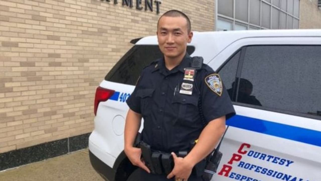 NYPD officer accused of spying for China has charges dropped, Faces ...