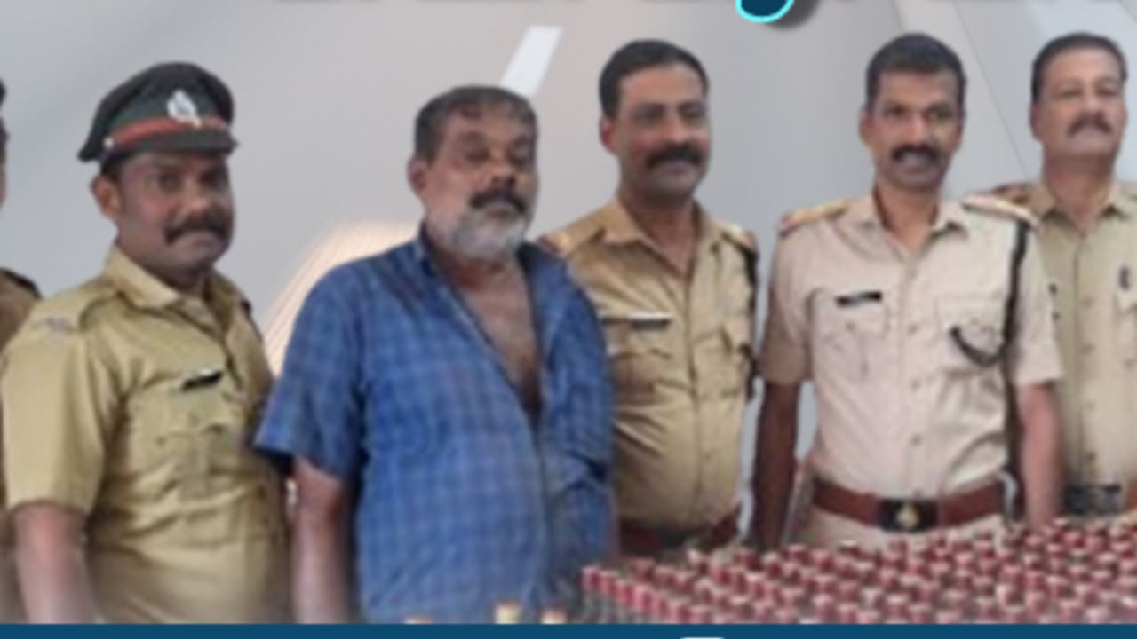 man arrested for smuggling 140 litre mahe foreign liquor during vehicle ...