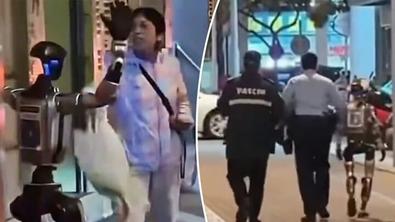 World’s First Robot Arrest? Police Escort Humanoid After It Scares Elderly Woman in Macau (WATCH)